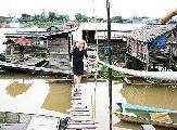 Foto: Cilts sievietes un saldūdens delfīnu meklējumi Borneo